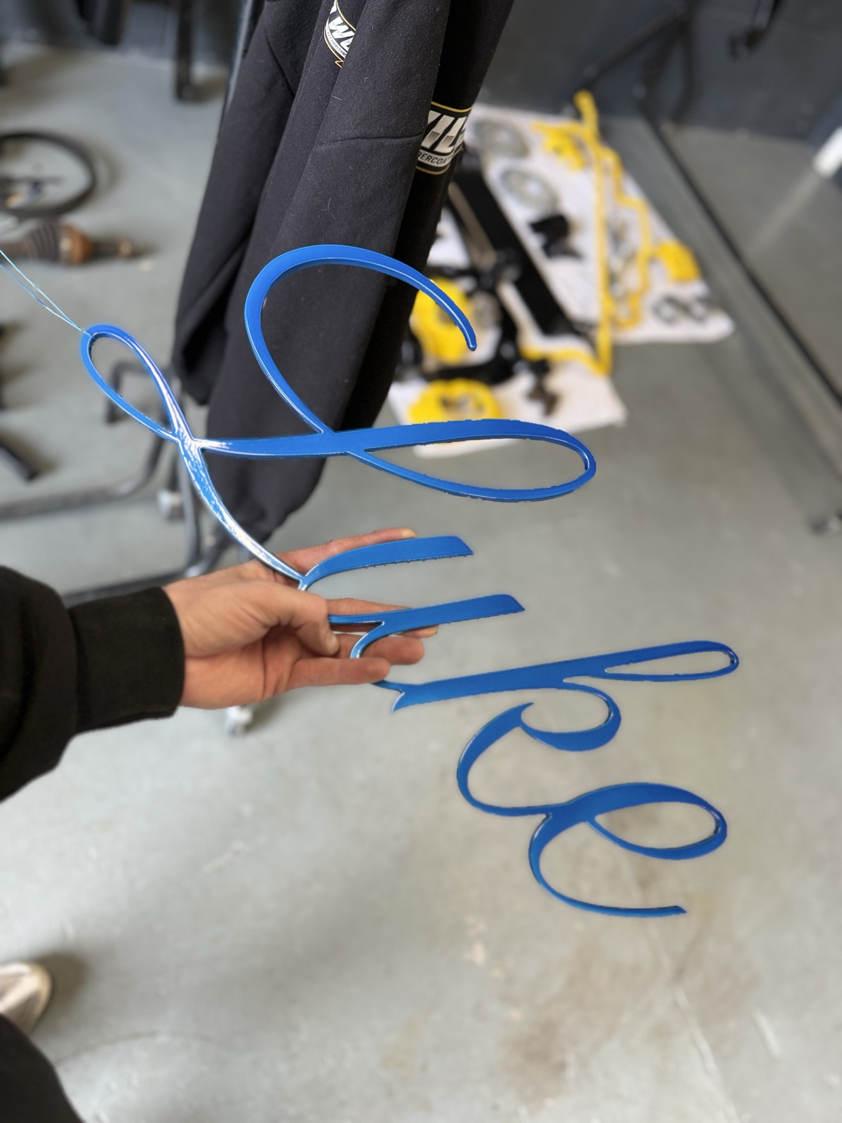 Custom script sign freshly powder coated in blue